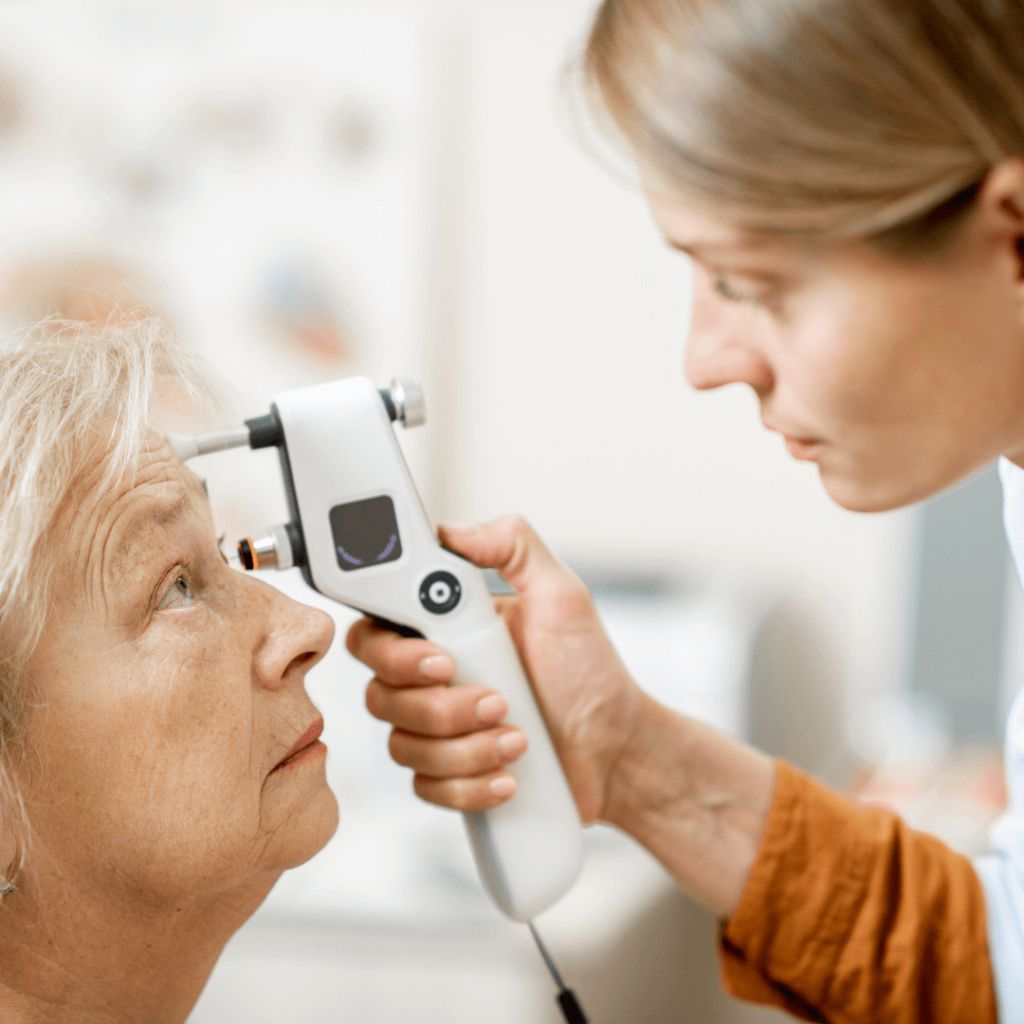 A senior woman having her eyes examined by an optometrist.